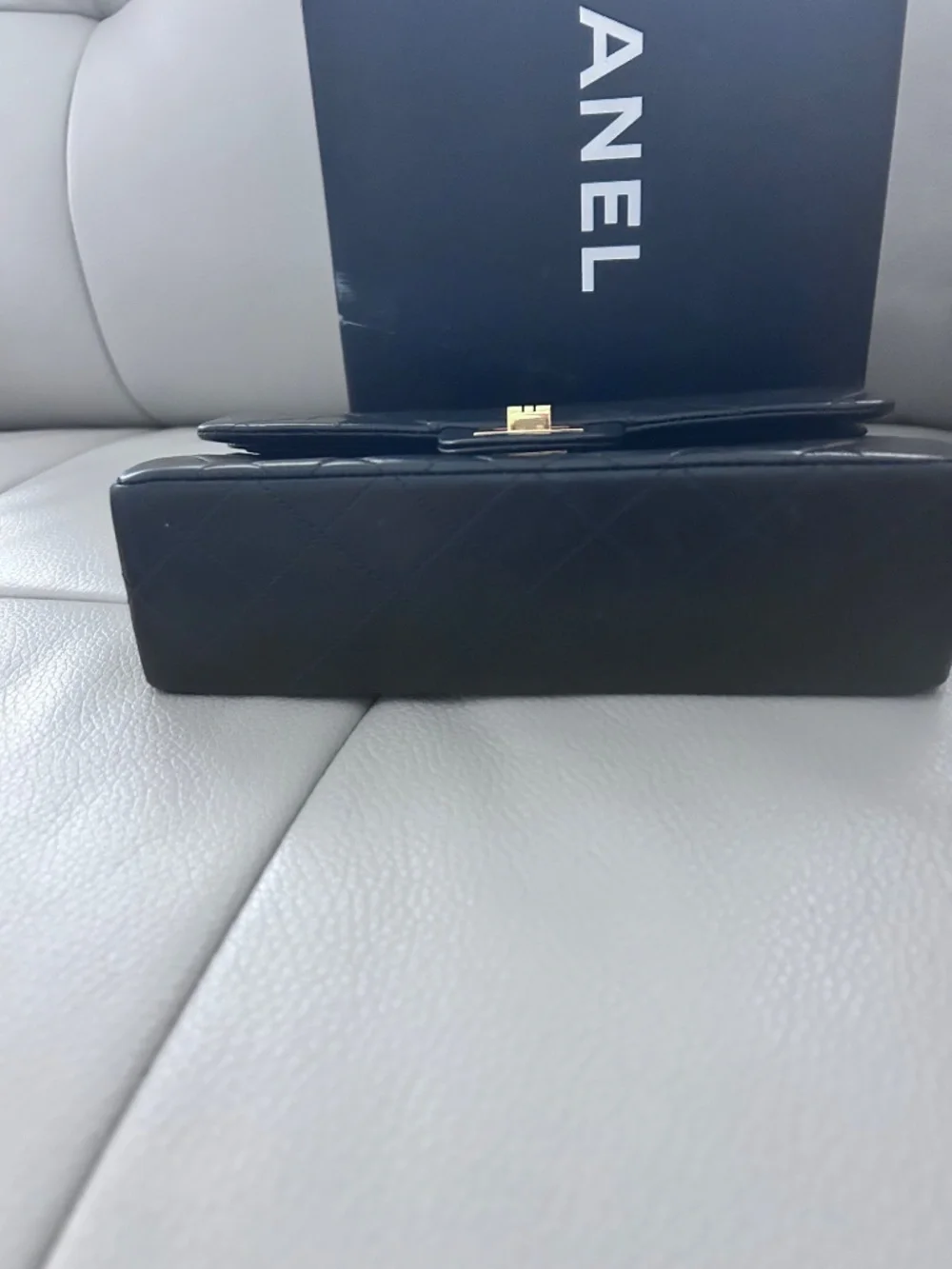 Chanel 2.55 flap bag, black calfskin and gold hardware